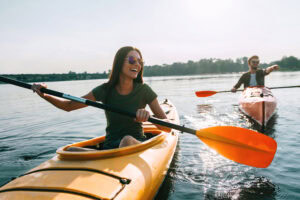 Couple paddling on a lake