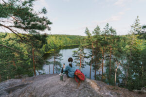 Woman sitting and watching the views.