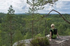 Woman sitting on top of a fell